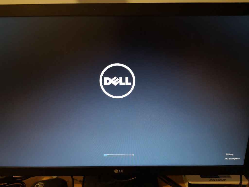 Why is my laptop screen stuck on the Dell logo