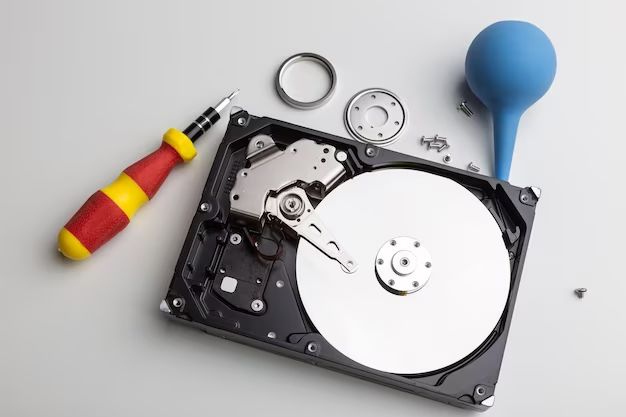 How do you take apart and destroy a hard drive