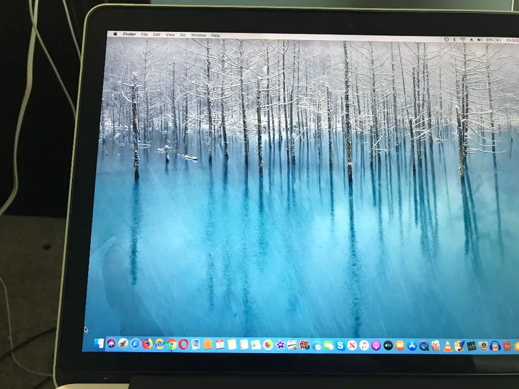 Will water inside MacBook screen dry