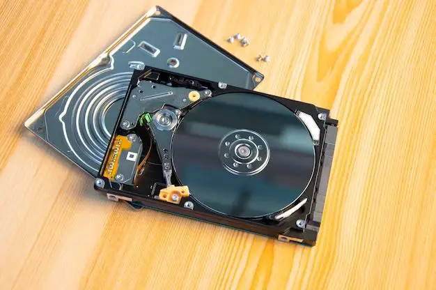 What does the hard disk do to store data