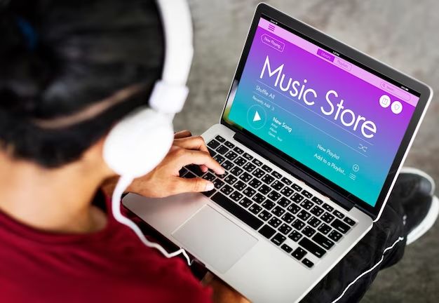 How do I download music from Apple Music to my laptop