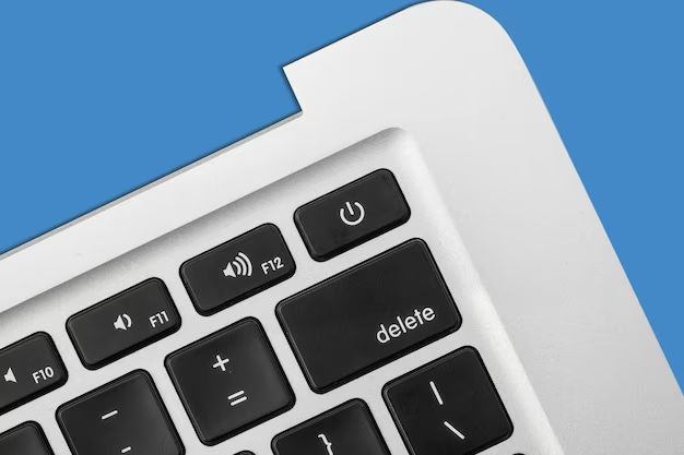 What keys do you press to erase a Mac