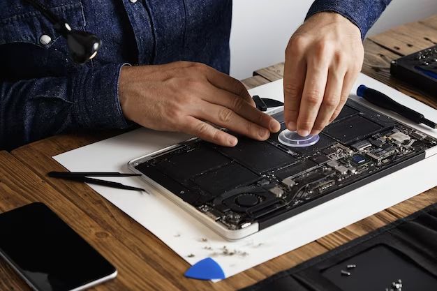 Is it better to repair or replace a MacBook Pro